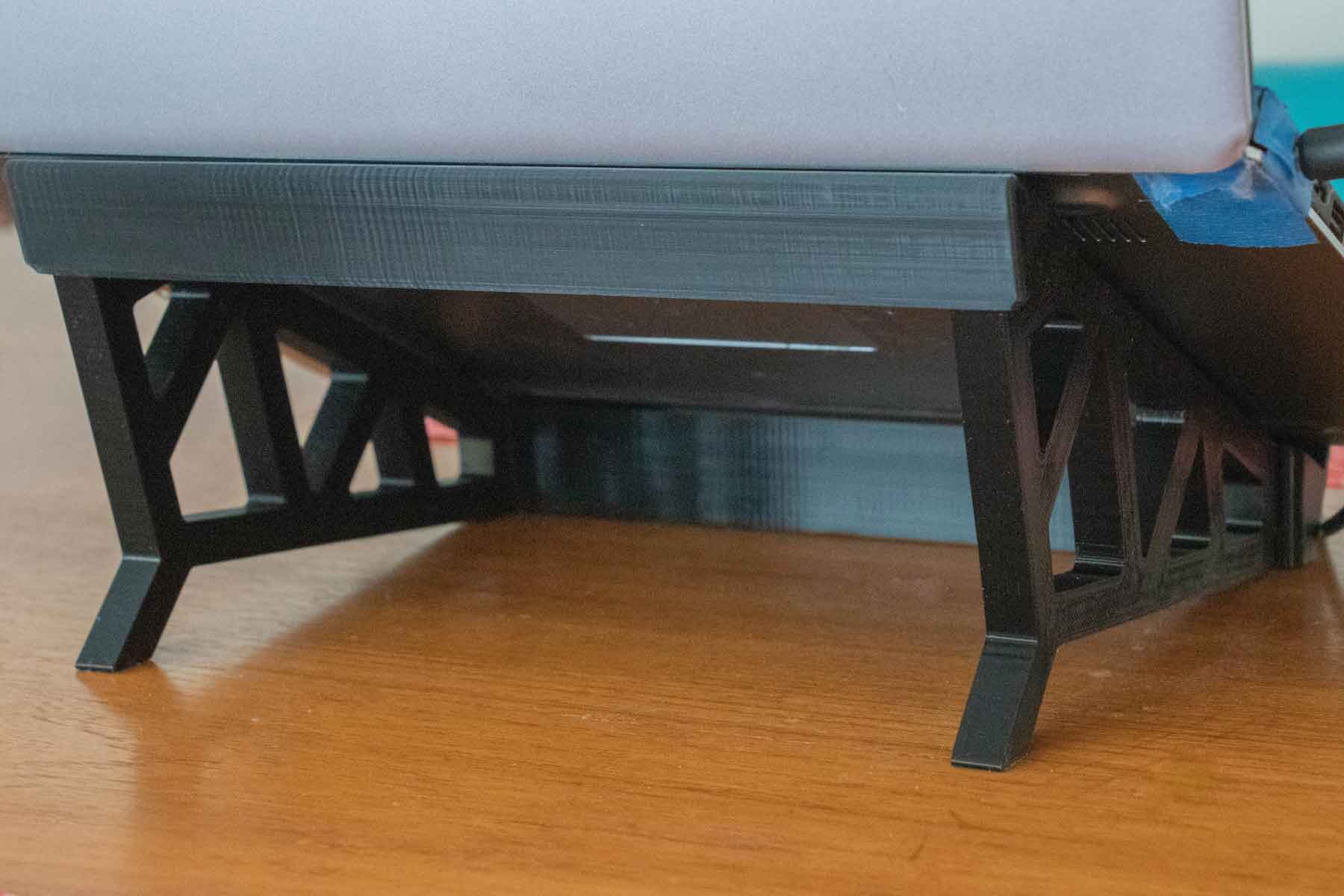 back view of a laptop stand